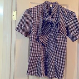 Made of Emotions, size XL, black checkered shirt.